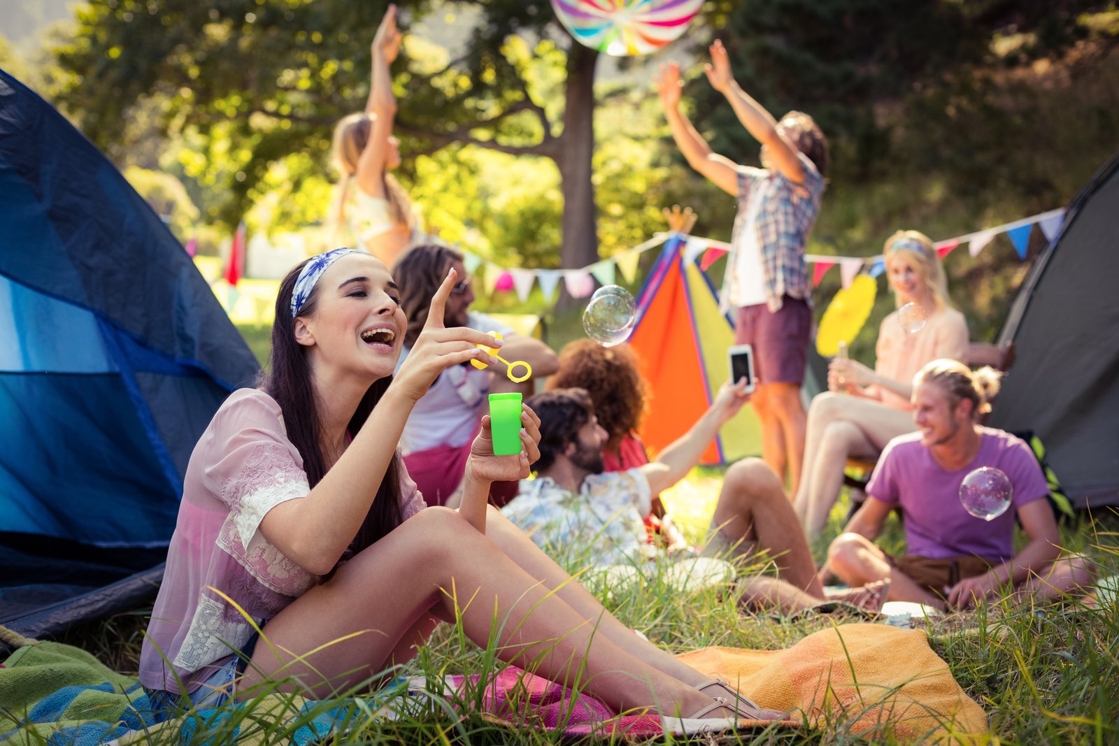 friends enjoy bubbles and beach ball at campsite 2026 03 26 11 50 45 utc - Camping Check