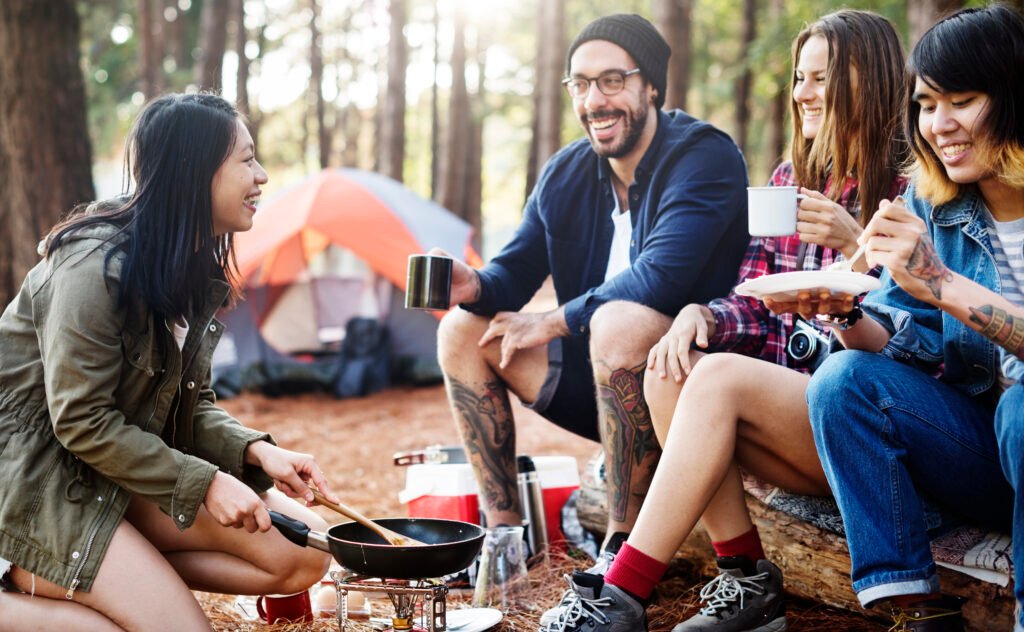 group of friends hanging playing cards together co 2026 01 07 23 39 35 utc - Camping Check