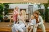 Cheerful family resting at the motorhome, camping