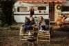 family camping on the background of the van