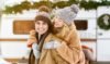 Romantic millennial couple having fun together at winter camping