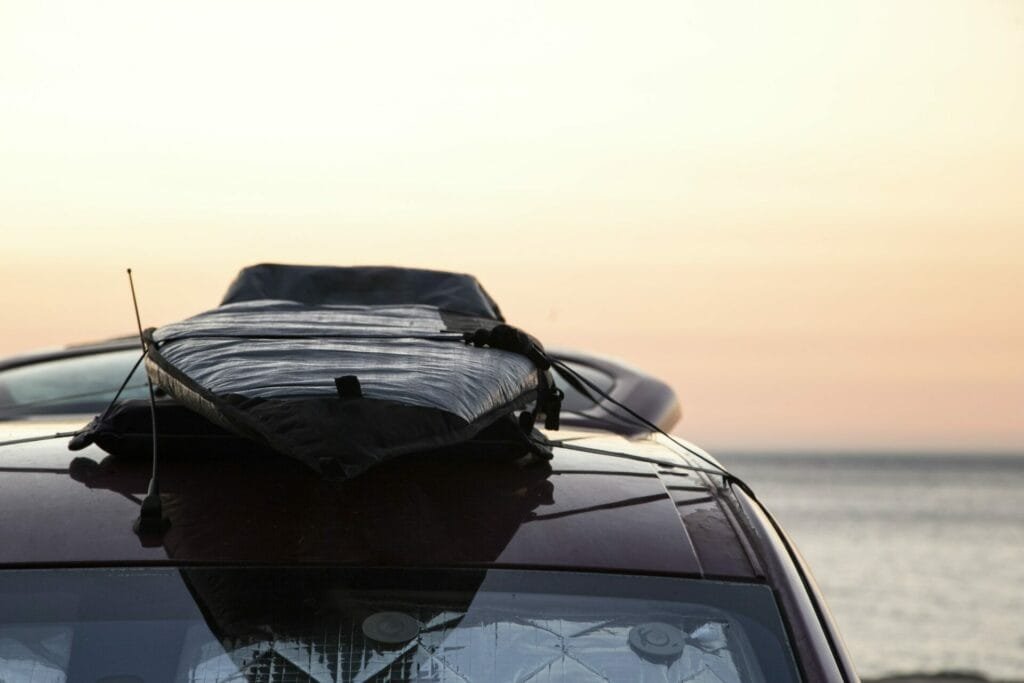 Campervan 4 surfboard on the roof of a van, let the road trip begin