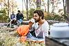 Man in sleeping bag drinking coffee, Deer Park, Cape Town, South Africa