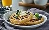 blueberry waffles with mint garnish