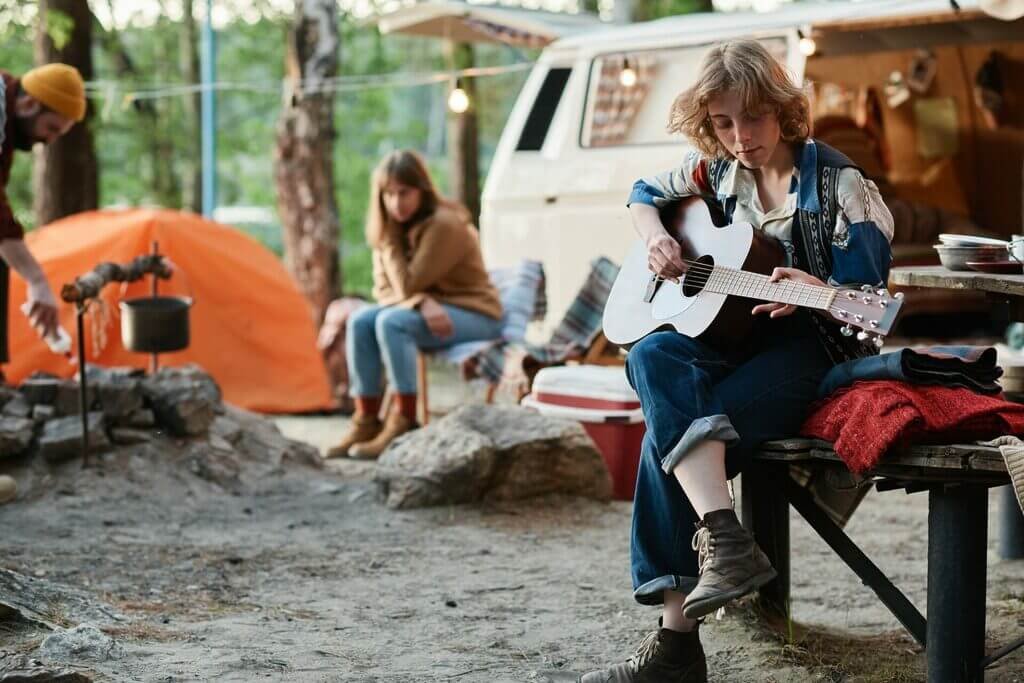 Woman sitting in a camp on the nature