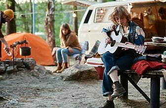 Woman sitting in a camp on the nature
