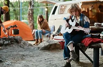 Woman sitting in a camp on the nature