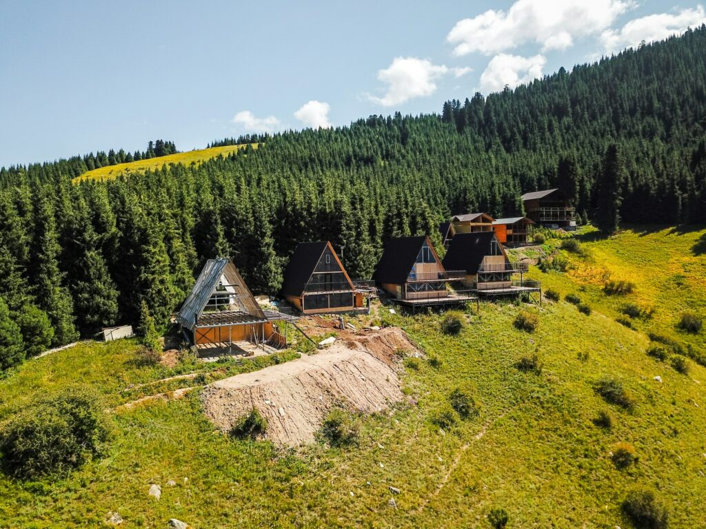 Aerial view of chalet cottages in mountain resort