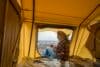 beautiful caucasian woman enjoy camping on tent
