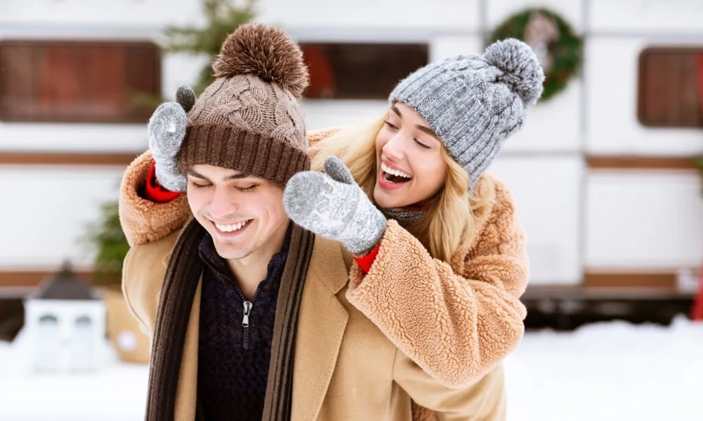 Young Couple In Love Having Fun Outdoors At Winter Day