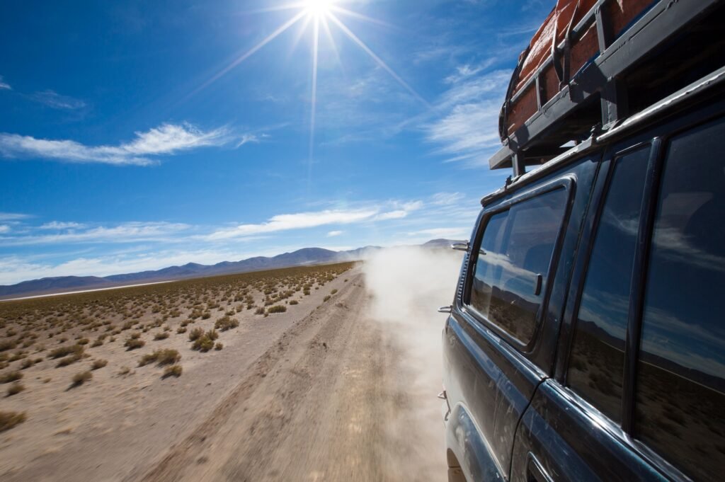 Off-road vehicle driving in the Atacama desert, Bolivia